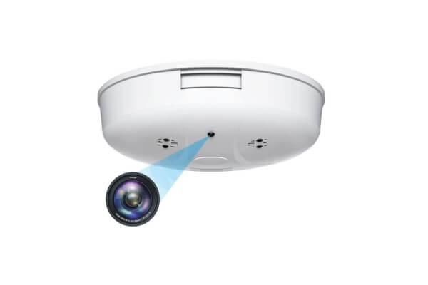 smoke detector with unusual hole resembling camera lens
