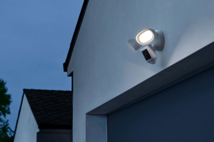 Porch light camera with motion detection and light activation