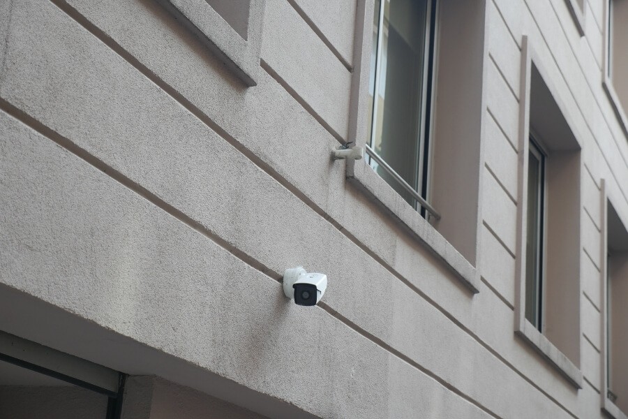 security cameras installed in apartment hallway common area of rental property