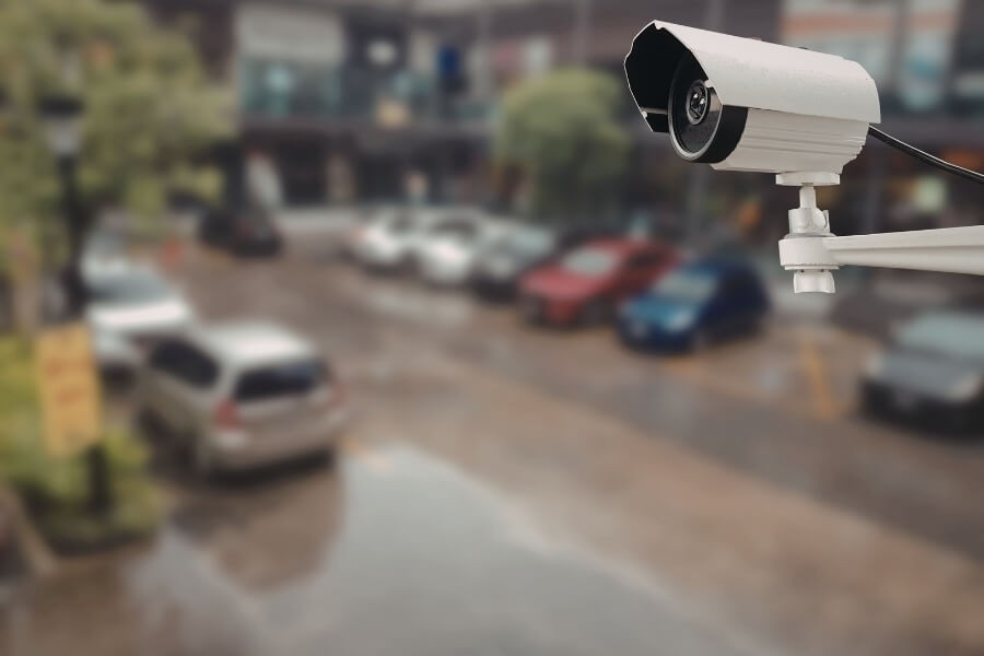 landlord security camera monitoring apartment parking lot for safety